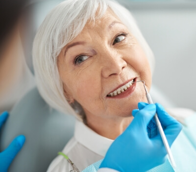eine zufriedene Patientin